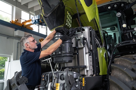 Mechanic checking the vehicle.