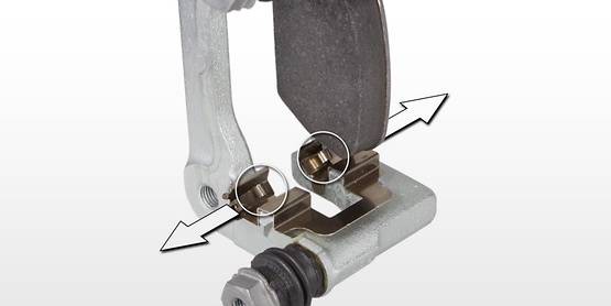 The springs pull the brake pads back to create a greater running clearance