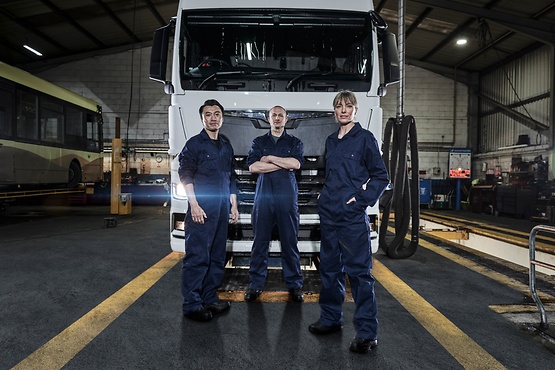 ZF proService man standing infront of truck